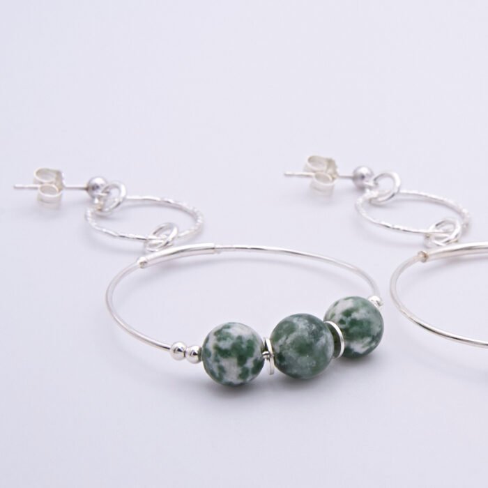 Green Spot Jasper Two-Hoop Sterling Silver Earrings close up of beads, shown on plain white surface