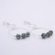 Green Spot Jasper Two-Hoop Sterling Silver Earrings side view of both earrings on plain white surface