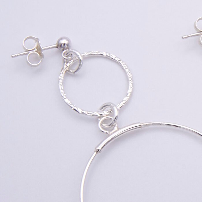 Green Spot Jasper Two-Hoop Sterling Silver Earrings close up of textured loop and ear post shown on plain white surface