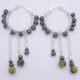 Yellow Turquoise and Hematite Wire-wrapped Hinged Hoop Dangle Sterling Silver Earrings shown side by side on flat white surface