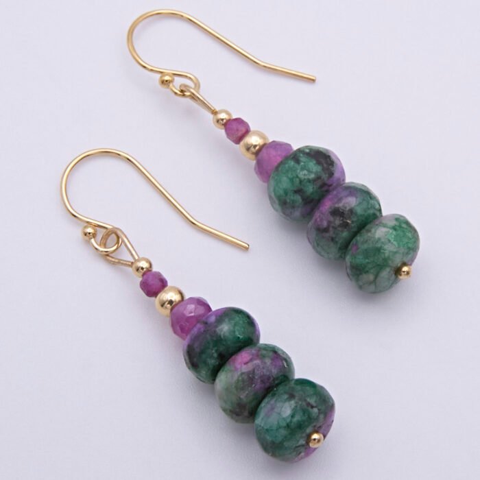 Ruby and Ruby Zoisite Gold Filled Stack Earrings shown from above laid flat on white surface