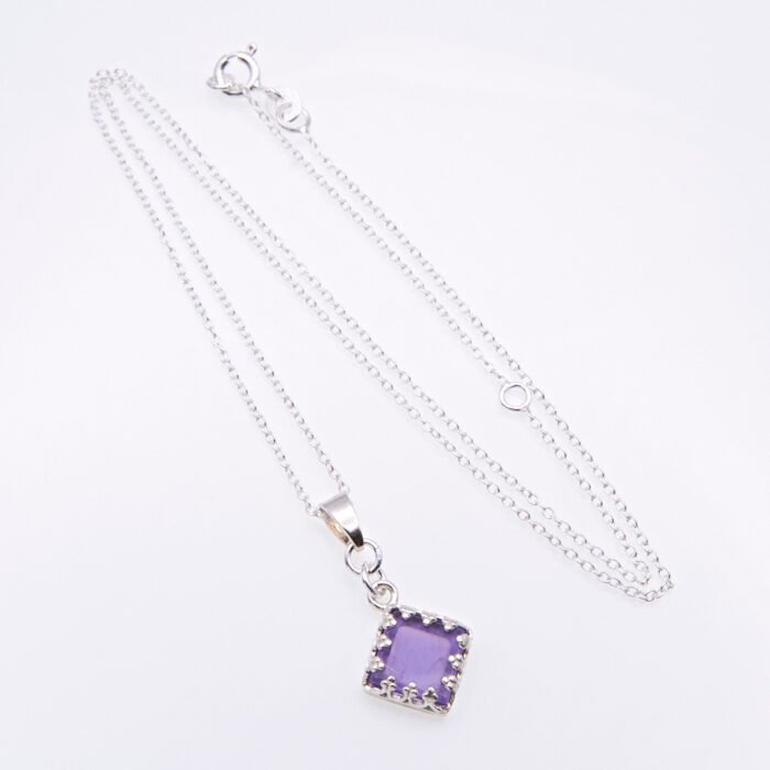 Amethyst Square Cabochon Sterling Silver Pendant Necklace laid flat on white surface