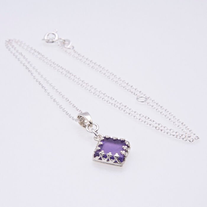 Amethyst Square Cabochon Sterling Silver Pendant Necklace with focus on side profile of bezel set cabochon