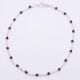 Black Enamel Bead Sterling Silver Bracelet shown viewed from above on flat white background