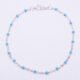 Turquoise Enamel Bead Sterling Silver Chain Bracelet shown viewed from above on plain white background