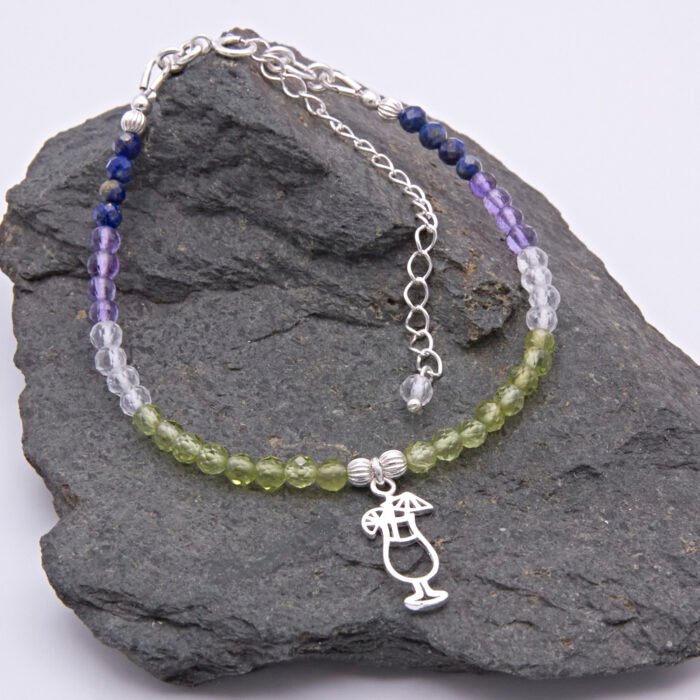 Cocktail Mixed Gemstone Sterling Silver Bracelet shown on dark grey stone