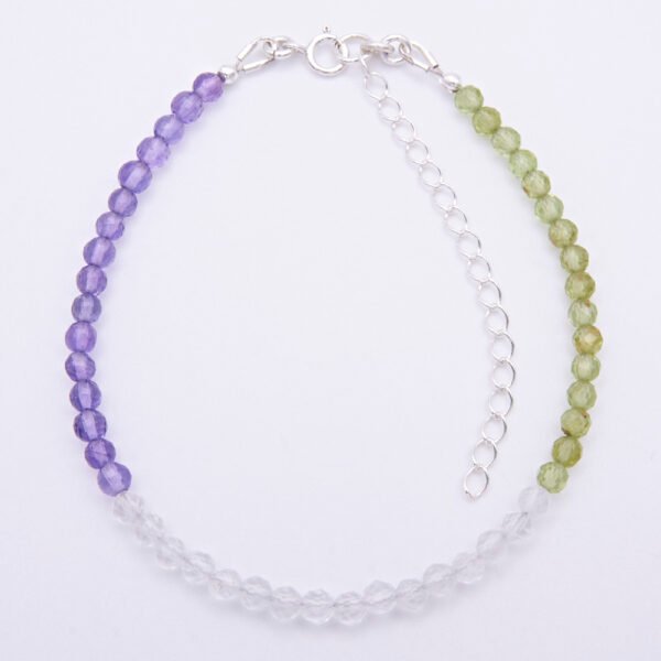 Genderqueer Flag Colours Amethyst, Crystal Quartz and Peridot Gemstone Bracelet with Sterling Silver clasp and extender chain, shown viewed from above on plain white background
