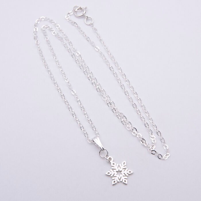 Sterling Silver Snowflake Charm Necklace, image shows entire necklace laid flat on plain white background