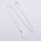 Sterling Silver Snowflake Charm Necklace, image shows entire necklace laid flat on plain white background