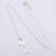 Sterling Silver Cocktail Charm Pendant Necklace, image shows entire necklace laid flat on plain white background