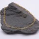 Gold Filled Heart Link Chain Anklet shown on dark grey stone