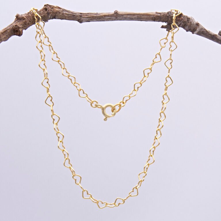 Gold Filled Heart Link Chain Anklet shown hanging from twig