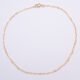 Tiny Hearts Gold Filled Ankle Chain shown from above on plain white background