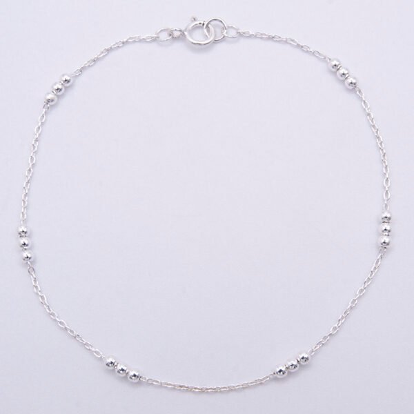 Sterling Silver Three Bead Chain Bracelet shown viewed from above on plain white background