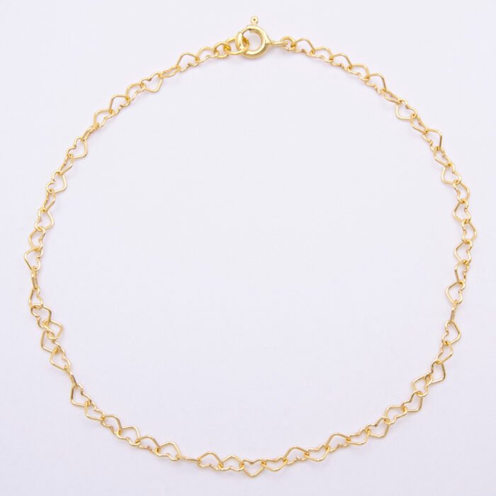 Gold Heart Link Chain Bracelet shown viewed from above on plain white background