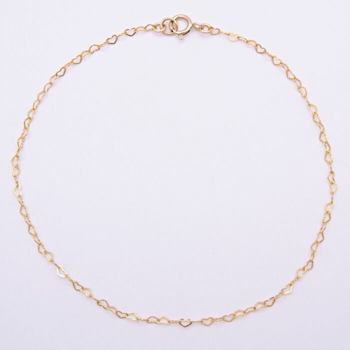 Tiny Gold Filled Heart Link Chain Bracelet shown viewed from above on plain white background