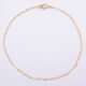 Tiny Gold Filled Heart Link Chain Bracelet shown viewed from above on plain white background