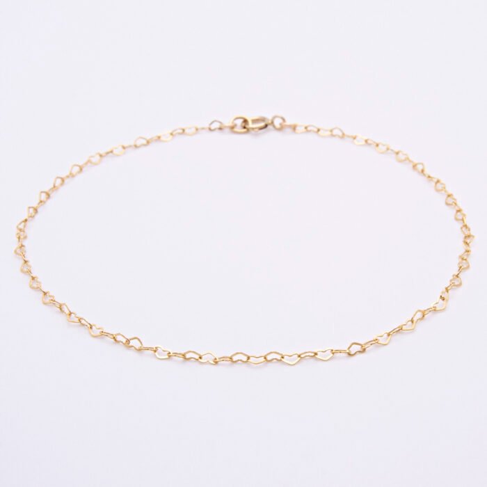 Tiny Gold Filled Heart Link Chain Bracelet shown laid flat on plain white background