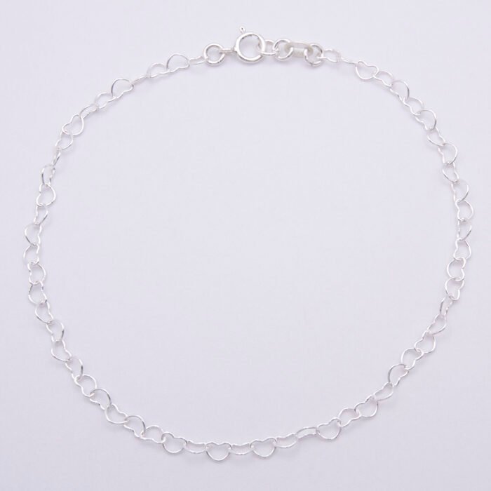 Sterling Silver Heart Link Chain Bracelet shown viewed from above on plain white background
