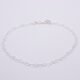 Sterling Silver Heart Link Chain Bracelet shown laid flat on plain white background