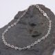Sterling Silver Tiny Heart Link Chain Bracelet Sterling Silver Tiny Heart Link Chain Bracelet displayed on dark grey stone