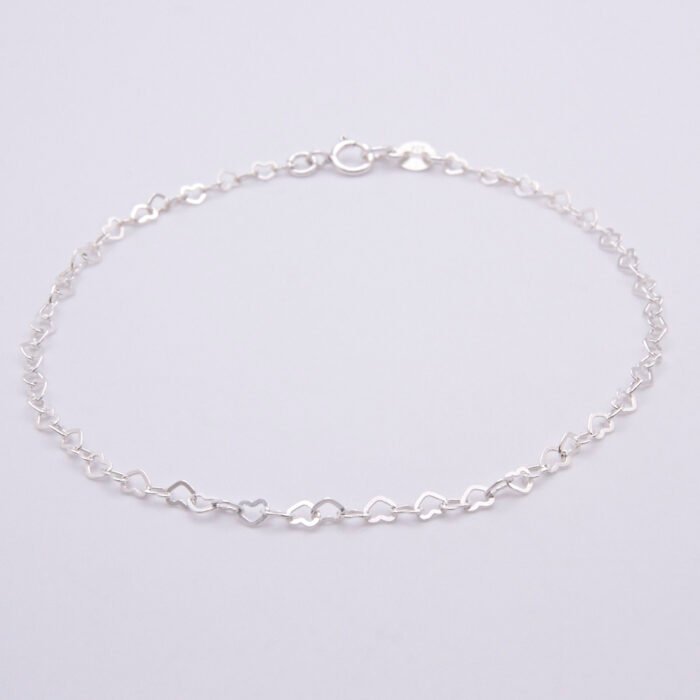 Sterling Silver Tiny Heart Link Chain Bracelet Sterling Silver Tiny Heart Link Chain Bracelet shown laid flat on plain white background