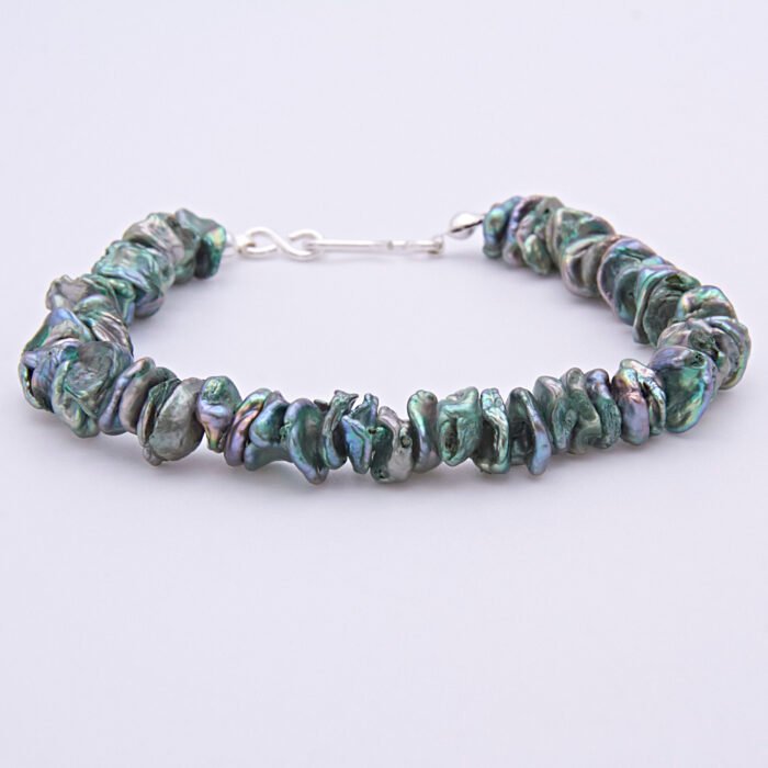 Green Keishi Cornflake Freshwater Pearl and Sterling Silver Bracelet, shown viewed from the front on plain white background