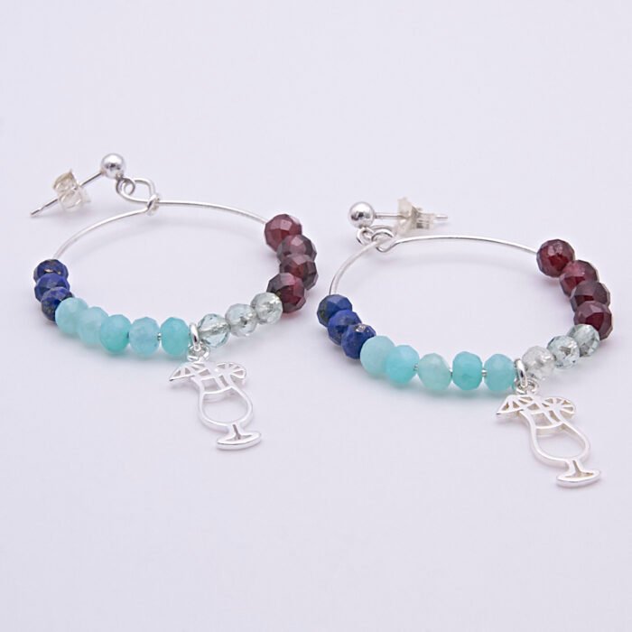 Mixed Gemstone Sterling Silver Hoop Earrings with Cocktail Charms shown laid flat on plain white surface with Cocktail charm towards the bottom