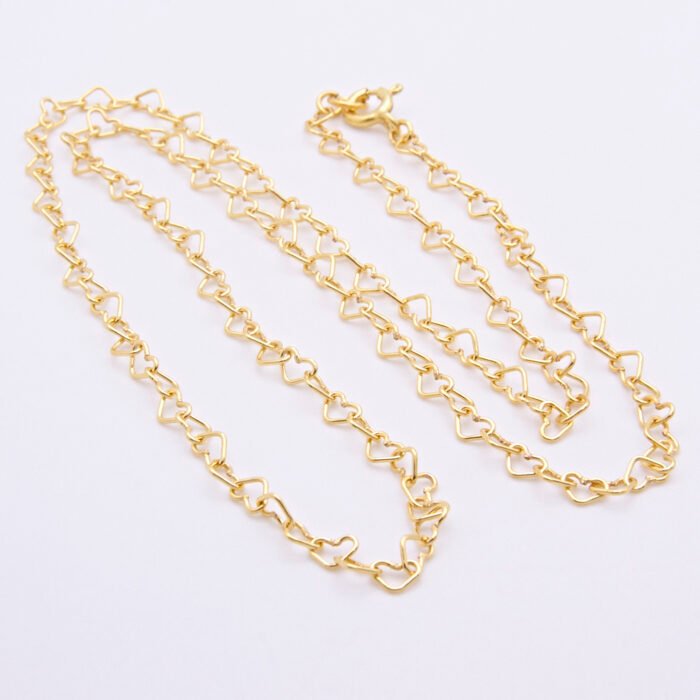 Gold Heart Link Chain Necklace shown on plain white background