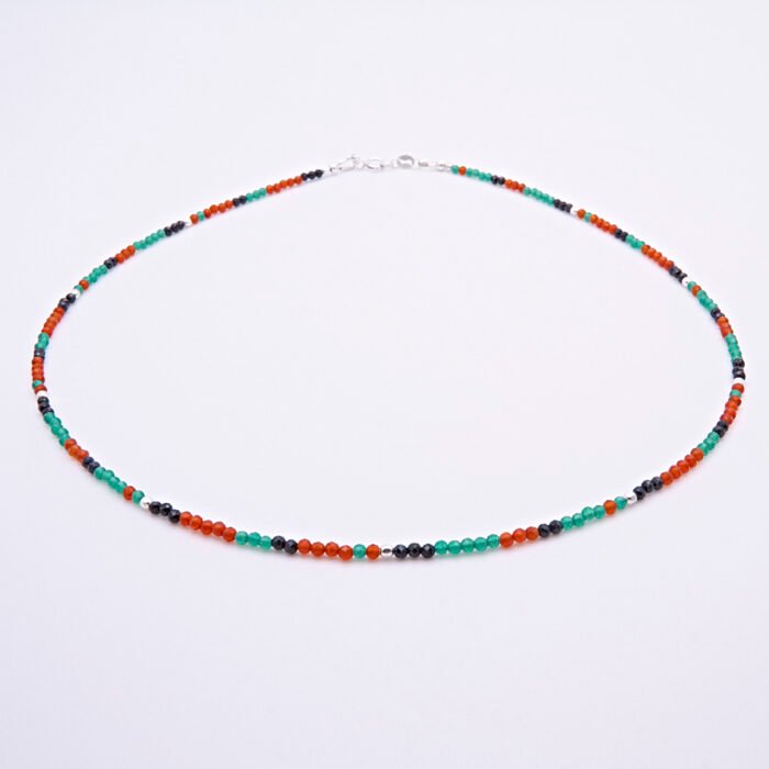Green Onyx, Carnelian and dark blue Sapphire gemstone necklace with silver clasp shown on plain white background with clasp at the top of the image