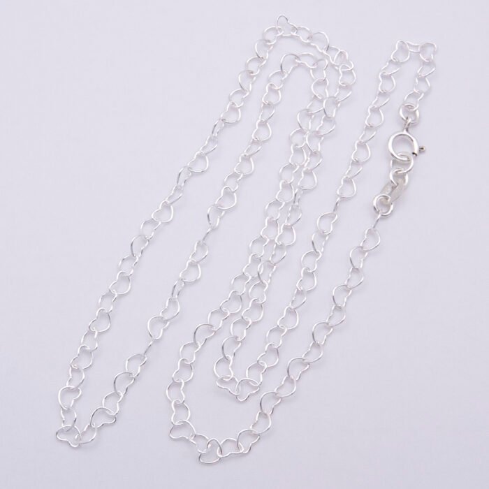 Sterling Silver Heart Link Chain Necklace shown laid on plain white background in a slightly angled N shape