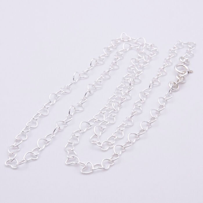 Sterling Silver Heart Link Chain Necklace shown on plain white background in an angled N shape