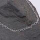 Sterling Silver Heart Link Chain Necklace shown on dark grey stone