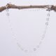 Sterling Silver Small Heart Link Chain Necklace shown hanging from twig