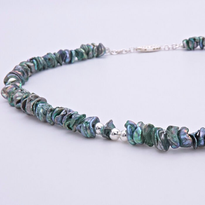 Green Keishi Cornflake Freshwater Pearl and Sterling Silver Necklace, image shows close-up of part of pearl strand and clasp