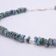 Green Keishi Cornflake Freshwater Pearl and Sterling Silver Necklace, image shows close up of part of pearl strand with sterling silver beads and clasp at the top of the image
