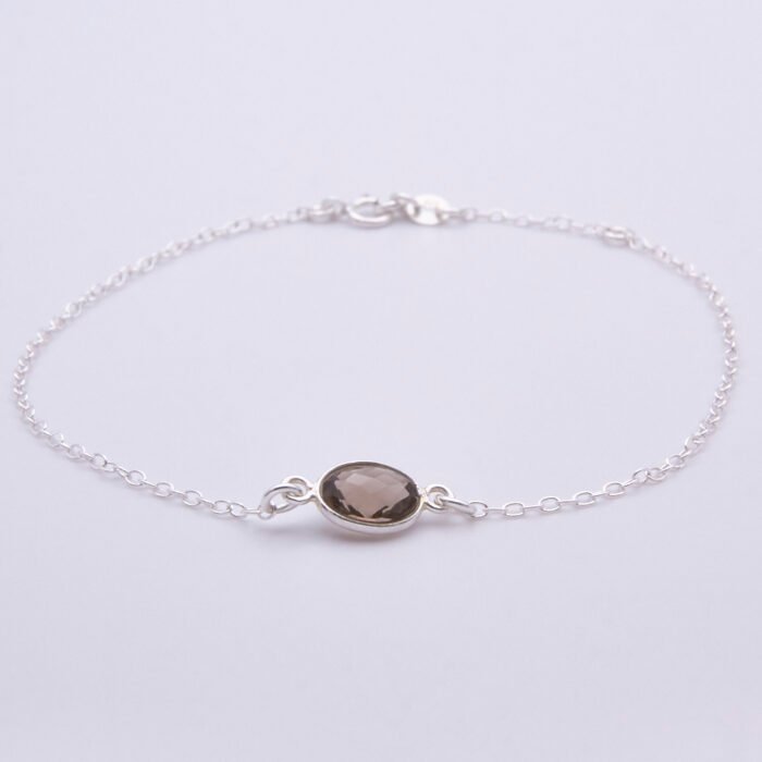 Smoky Quartz Oval Bezel-set Gemstone Sterling Silver Bracelet, shown from the front on plain white background