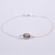 Smoky Quartz Oval Bezel-set Gemstone Sterling Silver Bracelet, shown from the front on plain white background