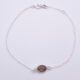 Smoky Quartz Oval Bezel-set Gemstone Sterling Silver Bracelet, shown from above on plain white background, with extender chain fully in use