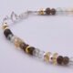 Smoky Quartz, Green Amethyst and Citrine Sterling Silver bracelet with 3D leaf charm, image shows close-up of clasp and beads on either side, on plain white background