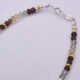 Smoky Quartz, Green Amethyst and Citrine Sterling Silver bracelet with 3D leaf charm, image shows clasp end of bracelet with beads on either side, on plain white background
