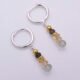 Sterling Silver Hinged Hoop Earrings with Gemstone Dangles, shown from above on plain white background