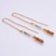 Autumn Colours Mixed Gemstone Gold Threader Earrings, shown from above on plain white background