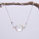 Smoky Quartz or Crystal Quartz round bezel set faceted gemstone Sterling Silver necklace Smoky Quartz or Crystal Quartz round bezel set faceted gemstone Sterling Silver necklace, image shows Crystal Quartz necklace hanging from twig