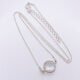 Smoky Quartz or Crystal Quartz round bezel set faceted gemstone Sterling Silver necklace Smoky Quartz or Crystal Quartz round bezel set faceted gemstone Sterling Silver necklace, image shows Crystal Quartz necklace from above on plain white background with gemstone at the bottom of the image