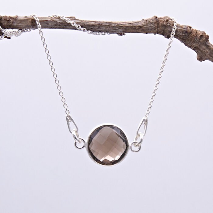 Smoky Quartz or Crystal Quartz round bezel set faceted gemstone Sterling Silver necklace Smoky Quartz or Crystal Quartz round bezel set faceted gemstone Sterling Silver necklace, image shows Smoky Quartz necklace hanging from twig