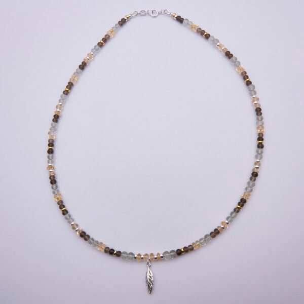 Leaf Charm Mixed Gemstone Necklace shown from above on plain white background