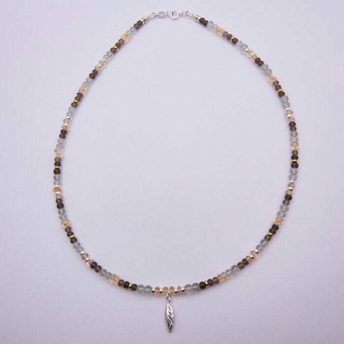 Leaf Charm Mixed Gemstone Necklace shown from above on plain white background