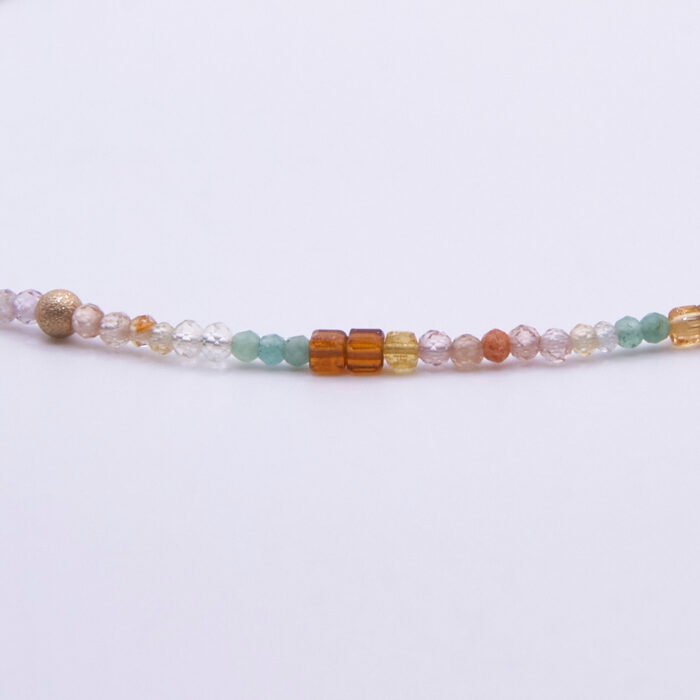 Autumn Colours Mixed Gemstone Gold Vermeil Necklace, image shows close-up of part of gemstone strand on plain white background
