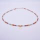 Mixed Metals Gemstone Necklace with Gold Leaf Charm, image shows necklace from the front on plain white background